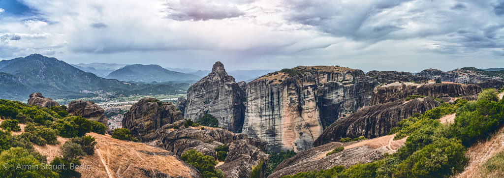 huge rock formation in the mountainous landscape of meteora, greece