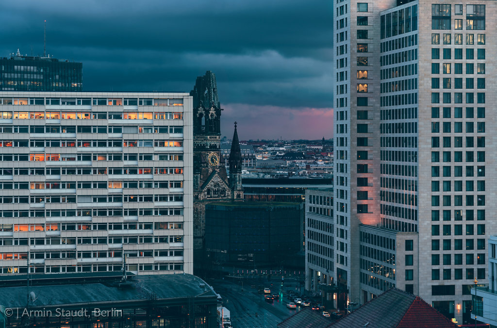 Gedächtniskirche Berlin in the evening, with dark clouds